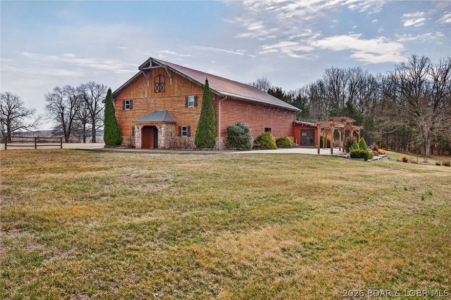 This 5,300 sq ft two-story wedding barn and event venue sits on 5 scenic acres in a peaceful rural country setting and is designed to accommodate up to 200 guests with seating on both the upper and lower levels. The property features separate bridesmaids’ and grooms’ dressing rooms, three bathrooms, ample storage, and a dedicated goodie barn for décor and event items, along with abundant on-site parking. An outdoor patio provides flexible space for gatherings and ceremonies, complemented by a dedicated outdoor ceremony area with arbor and benches, allowing for both indoor and outdoor events. With its versatile layout and turnkey infrastructure, this property is ideal for weddings, receptions, corporate events, private parties, and can easily function as a multi-purpose event venue with strong income potential.