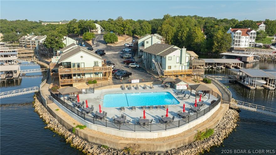 Escape to the stunning Lake of the Ozarks with this charming one-bedroom, one-bath condo at Southwood Shores, where relaxation meets exceptional investment potential. Recently updated with a stylish new backsplash, smart TVs, modern fixtures, and thoughtful finishing touches, this move-in-ready retreat is perfect for personal enjoyment or as a rental opportunity. The community is designed for year-round fun, featuring an indoor pool with a hot tub, a lakefront outdoor pool, a spacious swim platform with direct lake access, a playground, tennis and basketball courts, and a scenic waterfront boardwalk ideal for leisurely strolls or fishing. Whether you’re seeking a peaceful getaway or an active lakefront lifestyle, this property truly offers the best of both worlds. With its clubhouse, indoor amenities, and extensive outdoor features, you can enjoy the perfect retreat in any season. This turnkey unit also includes a 10x24 boat slip with a double PWC lift—just bring your toothbrush and start enjoying lake life while taking advantage of its impressive income-producing potential.