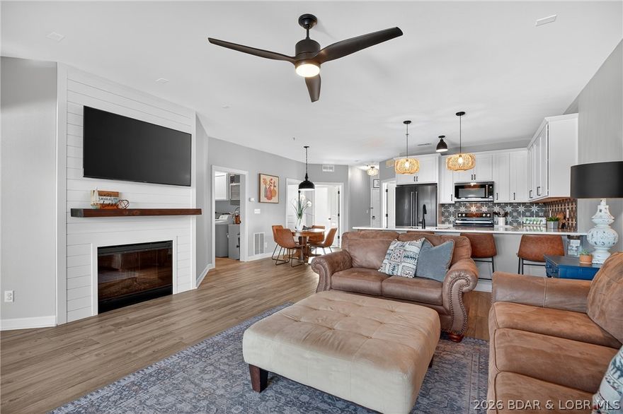 Enjoy a calm,private lake setting in this updated 3-bedroom,2-bath condo located in the gated Sunset Palms community.Tucked into a smaller,residential-only complex w/ no nightly rentals,this property offers a quiet atmosphere on a desirable stretch of the lake while still providing convenient access to shopping, dining, & nearby amenities.
The thoughtfully designed floor plan creates a comfortable flow between the kitchen, dining area, & living space, all oriented toward the beautiful main channel views.Large sliding doors open to a covered deck overlooking the water—an ideal place to relax,take in the scenery, or watch the steady rhythm of boats passing throughout the day.
The primary bedroom faces the lake and includes an updated ensuite bath designed for comfort & simplicity.Two additional bedrooms provide flexible space for guests, family, or a home office.A 12x32 boat slip & PWC slip are included,offering easy access to time on the water.Sunset Palms residents enjoy a lakefront pool,hot tub,elevator access, and well-kept grounds that reflect pride of ownership throughout the community. Pre-listing inspection and one-year home warranty included. Garage available separately.