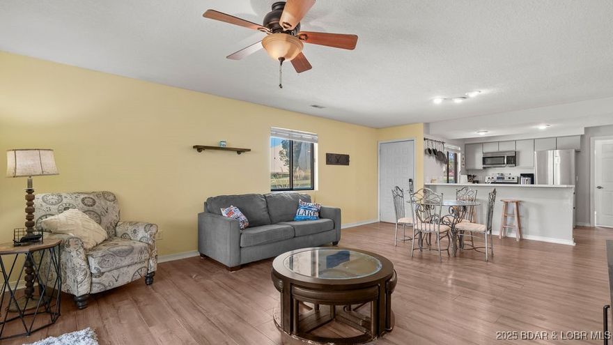 Welcome home to the Osage Vista's community. This top floor unit is perfectly situated toward the back of the property overlooking a serene wooded area with wildlife presence. Step inside to a beautifully updated 3 bedroom, 2 bathroom, open floor plan with over 1200sqft of living space, and a new HVAC in 2024. The master bedroom features its own private bathroom that includes a walk-in shower, and walk in closet. Off of the large living area is a screened back porch great for evening relaxation and grilling. The complex is equipped with 6 pools, a playground, and plenty of acreage for walking your pets, riding bikes, or strolling around in your golf cart. Use it as an air b & b as it is home to the Hippo swim up bar offering summer concerts, and an indoor bar & grill. This adorable condo also has access to four seasons amenities such as an indoor pool, fitness center, campground, pickle ball courts, dog park, boat trailer parking, and more.
Within 5 minutes of the Bagnell Dam Strip, dining, boat ramps, golf & shopping this condo is sure to check all the boxes for full time lake life or investment opportunities! Don't skip out on seeing this one. Make an appointment to view today!