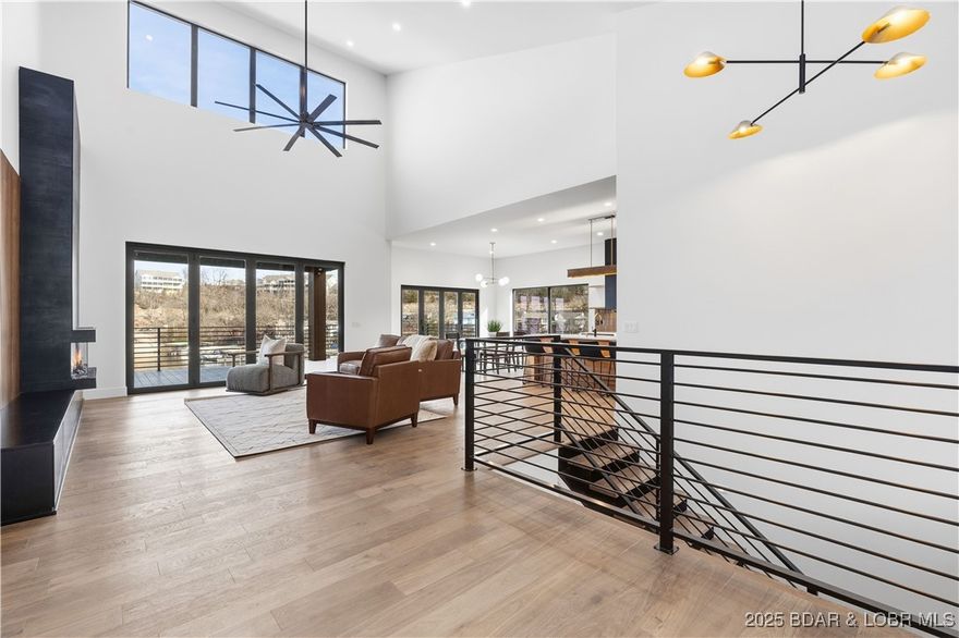 BRAND NEW CUSTOM HOME located on the 3 Mile Marker of Horseshoe Bend!! This stunning, modern style build captivates all the aspects of lake life. This home boasts 5 spacious bedrooms, 7 beautifully designed bathrooms, a state-of-the-art kitchen, and a custom Wet bar/ entertainment area! This home has cove protection along the waterfront to allow for plenty of fun Lakeside, but still offers tremendous main channel views of the Lake of the Ozarks. This home is allowed a large space for a dock, but the seller is going to leave that part to the buyer for their personal customization. This highly customized home will be located just minutes from the Heart of Osage beach, Four Seasons golf courses, and a plethora of great restaurants on the Lake.