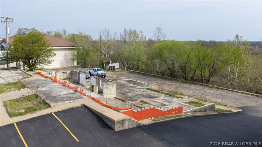 Prime Commercial Opportunity! This exceptional commercial lot is ideally situated in a well established section of Lake Ozark. It offers excellent highway frontage and outstanding exposure for your business. With a strong daily traffic count, this location provides maximum visibility and easy accessibility - perfect for a wide range of commercial uses. This property presents a valuable opportunity for investors, developers, and business owners looking to capitalize on a high demand corridor - close to the historic Bagnell Dam strip AND the planned casino. Don't miss out on this opportunity to secure a premium location with so much potential.