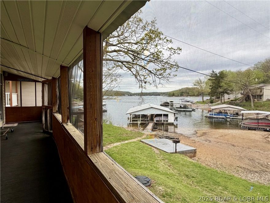 Welcome to your own little piece of paradise at an affordable price for Lakefront! Whether you're looking to rent it out as an investment, use it for your personal vacation spot, or live full-time, this is the perfect, comfortable place for you! Updates have been made throughout the interior with vynil siding to make it near maintanence free. There's also extra storage in a small garage if you need extra space, or you could turn it into a small workshop! House comes with it's own slip, and green space behind the house along the waterfront.