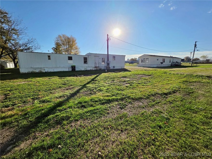 Prime Value-Add Mobile Home Park with 5 Lots, City Utilities and visible location. This investment opportunity sits across from the new Trail Head and close to the New Main Station Hotel with high visibility, strong location appeal, and convenient access to local amenities. This 5-lot mobile home park offers an immediate income base with 3 occupied units and clear upside for an investor ready to optimize operations.
Value-add opportunities include placing a unit on the vacant ready lot and addressing the remaining homesite that currently has a mobile home suited for removal or full renovation this creates multiple paths to increase cash flow and long term value. Owner owns the park and the trailers, making this a straightforward acquisition for buyers seeking both stability and growth potential.
Purchase one or both moblie home parks within blocks of eachother to your income potential even greater. See MLS 3582613