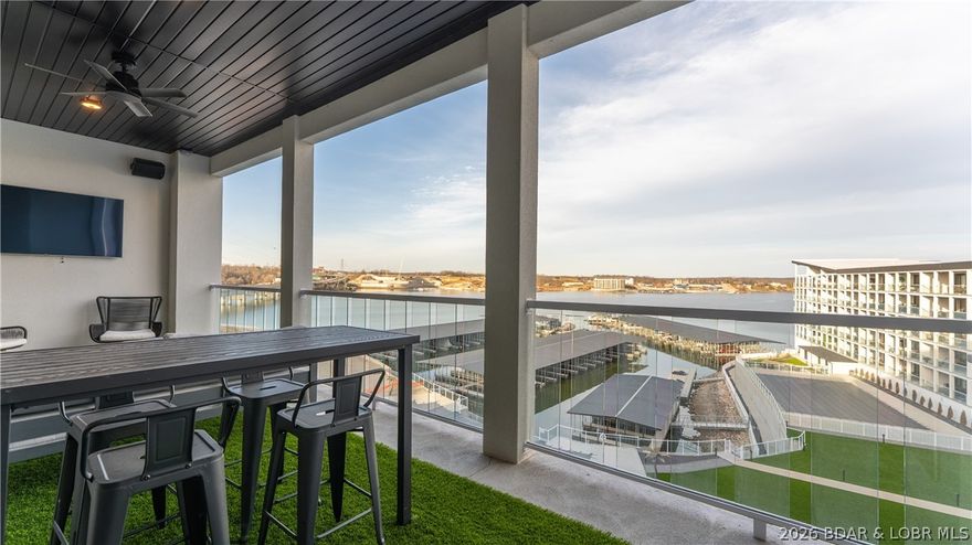 CALLING ALL HOSTS, ENTERTAINERS, AND LAKE-LIFE LOVERS! This top-floor 3 bed, 3 bath condo in the heart of Osage Beach is designed to be the gathering place. Located in a prime setting directly across from the new Oasis Amusement Park, this unit offers an ideal blend of location and lifestyle. Built for entertaining, the open layout is enhanced by customized luxury lighting, extended fireplaces, and a whole-home Sonos sound system that creates the perfect atmosphere for hosting. Upgraded matching quartz countertops, upgraded tile flooring throughout all bathrooms, and additional wiring throughout the condo allow for automatic blinds, expanded lighting, or additional speakers. Being sold fully turnkey with top-of-the-line furniture, appliances, premium TVs, and curated lake-life décor, this condo is truly move-in or rental ready. Whether you’re seeking a personal lake retreat or a high-end rental investment, this top-floor unit delivers comfort, convenience, and strong income potential in one complete package. Rarely available and built for entertaining—schedule your showing before it’s gone.