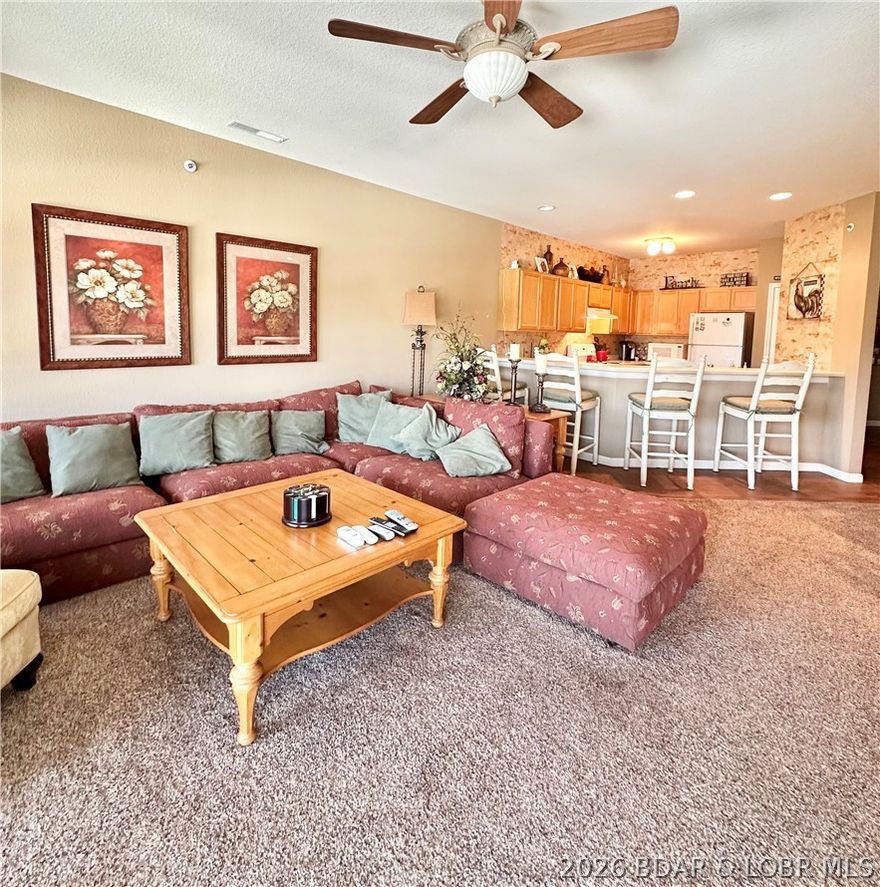 Top-floor condo with stunning main channel views at the 12 MM! This fully furnished 3-bedroom, 2-bath unit in Bristol Bay Condos offers the perfect blend of comfort and lake life. Enjoy an open living area that flows onto a spacious deck overlooking the water—ideal for relaxing or entertaining. Located in the highly desirable Horseshoe Bend area, you’re just minutes from popular waterfront dining, shopping, and nightlife. The complex features a community pool and a well-maintained setting. A 12x30 boat slip with 10,000 lb lift is included, along with a 2006 Sea Ray 270 SDX—making this a true turnkey lake package. Whether you're looking for a weekend retreat, investment property, or full-time lake living, this condo is ready for you to start enjoying the Lake today!