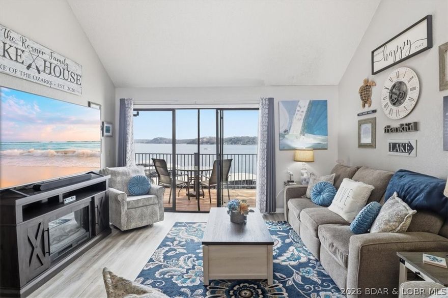 Experience lakefront living at its finest at the beautiful Lake of the Ozarks! This completely updated walk-in upper-level condo offers the ultimate convenience with no steps to climb.

Featuring 3 bedrooms and 2 full baths, plus a spacious loft serving as the third bedroom. This condo provides plenty of room for family and guests. Fully updated in 2025, the interior showcases modern finishes and a fresh, move-in-ready feel throughout.

Enjoy stunning lakefront access along with a community dock that includes a boat slip with hoist and a PWC slip—perfect for making the most of lake life.  Or spend a relaxing afternoon at the beautiful lake front swimming pool for relaxation with a cool beverage in the afternoon

Sold fully furnished, this turnkey property is ready for immediate enjoyment or long term rental. Whether you're looking for a full-time residence, vacation getaway, or investment opportunity, this condo checks all the boxes.

Don’t miss your chance to own a piece of paradise at Lake of the Ozarks!