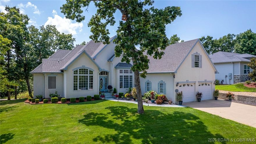 Lake Access is available with a 14x40 Boat Slip from the developer! Welcome to this one-owner, well-maintained home in the sought-after Estates Subdivision—located just minutes down HH. This spacious main-level living home w/ courtyard entry features soaring ceilings, hardwood floors, & a gas fireplace in great room. The formal dining room & adjacent living room provide the perfect space for entertaining. The kitchen includes updated countertops, stainless steel appliances, cabinet pullouts, & a breakfast area that leads to spacious decks with a seasonal lake view. The oversized laundry room includes a utility sink. The updated primary suite features heated bathroom floors, a custom-tiled walk-in shower, double vanity, & a spectacular HUGE walk-in closet w/ custom built-ins. Two additional bedrooms, a full bath, & a guest half bath complete the main level. Upstairs offers a private en-suite. Third garage on the lower level has street access and is heated/cooled—ideal for storage or workshop.Community pool with bathhouse, central sewer, trash, basketball court & more! Great area for walking  entertaining. Note- a 14x40 boat slip is available for $58,000-please call for details.