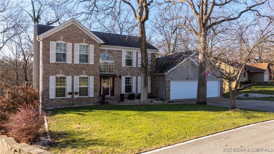 Spacious, updated, and ideally located in the heart of Osage Beach, this 5-bedroom, 4-bath home in Bell Woods Estates offers nearly 4,000 square feet of comfortable, flexible living with lake access and excellent community amenities. The updated kitchen features quartz countertops, stainless steel appliances, gas cooktop, double oven, glass tile backsplash, and modern finishes, flowing seamlessly into inviting living spaces with engineered wood floors and two gas fireplaces. The 3-car, extended garage ads extra room for storage and a workshop are, or a boat trailer!