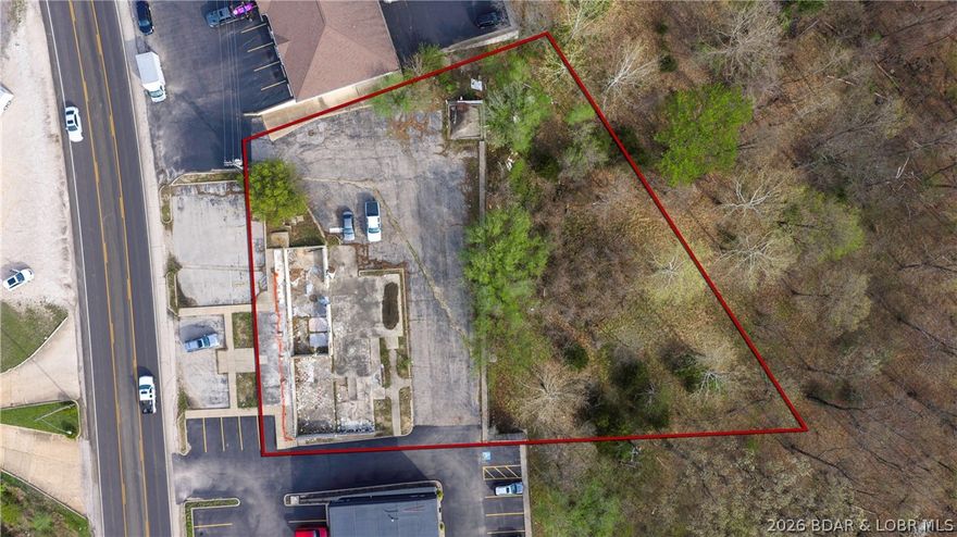 Prime Commercial Opportunity!  This exceptional commercial lot is ideally situated in a well established section of Lake Ozark.  It offers excellent highway frontage and outstanding exposure for your business.  With a strong daily traffic count, this location provides maximum visibility and easy accessibility - perfect for a wide range of commercial uses.  This property presents a valuable opportunity for investors, developers, and business owners looking to capitalize on a high demand corridor - close to the historic Bagnell Dam strip AND the planned casino.  Don't miss out on this opportunity to secure a premium location with so much potential.