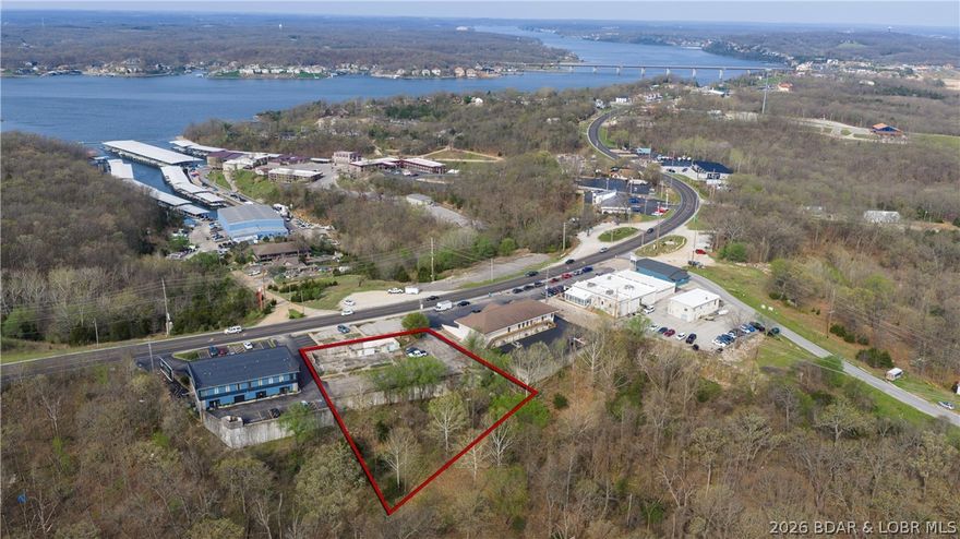 Prime Commercial Opportunity!  This exceptional commercial lot is ideally situated in a well established section of Lake Ozark.  It offers excellent highway frontage and outstanding exposure for your business.  With a strong daily traffic count, this location provides maximum visibility and easy accessibility - perfect for a wide range of commercial uses.  This property presents a valuable opportunity for investors, developers, and business owners looking to capitalize on a high demand corridor - close to the historic Bagnell Dam strip AND the planned casino.  Don't miss out on this opportunity to secure a premium location with so much potential.