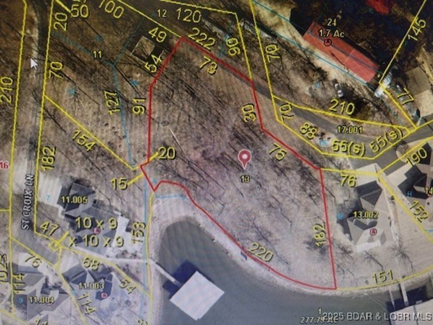 PRICE IMPROVEMENT!!  Rare opportunity to own a 220' lakefront lot overlooking the 26MM main channel of Lake of the Ozarks.  Some cove protection from the main channel will make for a perfect docking area.  All 220' has been seawalled with concrete.  Lot 5 in St Croix Estates in just over 3/4 of an acre.  Perfect lot for building your dream home.  Includes water and sewer rights and HOA takes care of the road and trash.  Venture out to see this amazing lot then call me for more info!