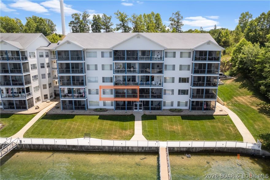 INCREDIBLE! One word describes this TRULY AWESOME unit's VIEW and Complex amenities! This Updated Unit has Beautiful Cabinetry, Tile and Plenty of Storage! A Large Screened & Tiled Deck is yours to enjoy the amazing view! Located at the beginning of the Beautiful Gravois Arm at Lake of the Ozarks, Nestled in a quiet, deep cove area that has easy access to restaurants, gas docks and the main channel. 2 swimming pools (1 fresh, 1 saltwater) 2 dedicated swim platforms (1 with kayak launch), an exercise facility, fenced playground (with basketball & pickleball courts), and some of the best fishing at the lake will surely keep your family and guests entertained! Unit includes a 12 x 32 slip in a well lit and maintained dock equipped with features such as water, electric, security cameras and fish cleaning stations. This complex is meticulously manicured and pet friendly! The boardwalk is great for evening strolls and enjoying the lake views! Friendly neighbors and events are just some of the reasons that make Blue Anchor Bay one of the most sought after condominium destinations at Wonderful Lake of the Ozarks! Located within Minutes of Fabulous Restaurants & Entertainment by Boat!