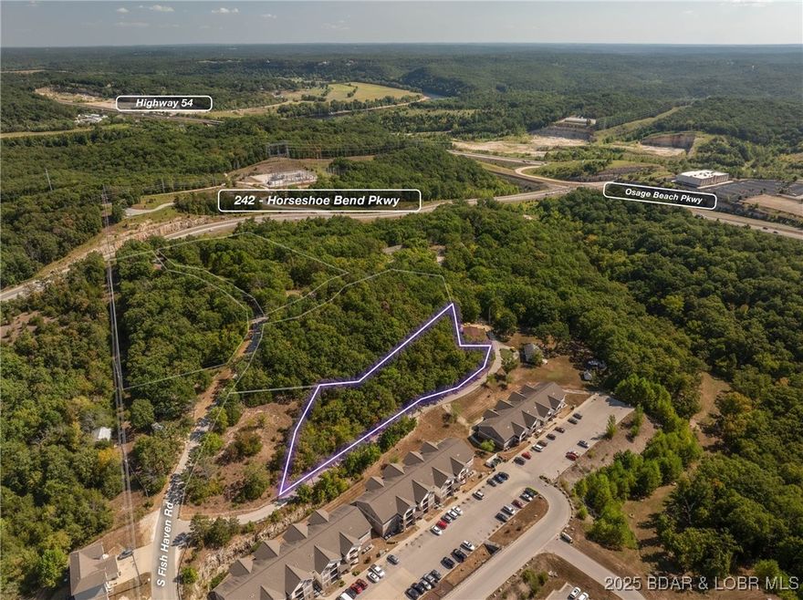 Gentle 1.2 lot ready for development and construction with a spectacular Lake Ozark Location. Road frontage with easy access from the city maintained Fish Haven Rd and Forrest Hills Rd. This is a large lot that would make a great homesite or there is the possibility of a multifamily situation. Of course everything would have to be city approved but the adjacent lot which is also listed, was zoned high density residential and this is in a future development area of Lake Ozark. City water and city sewer as well as electricity are available. Looking for more land, be sure to ask your agent, the seller has several parcels in this area!