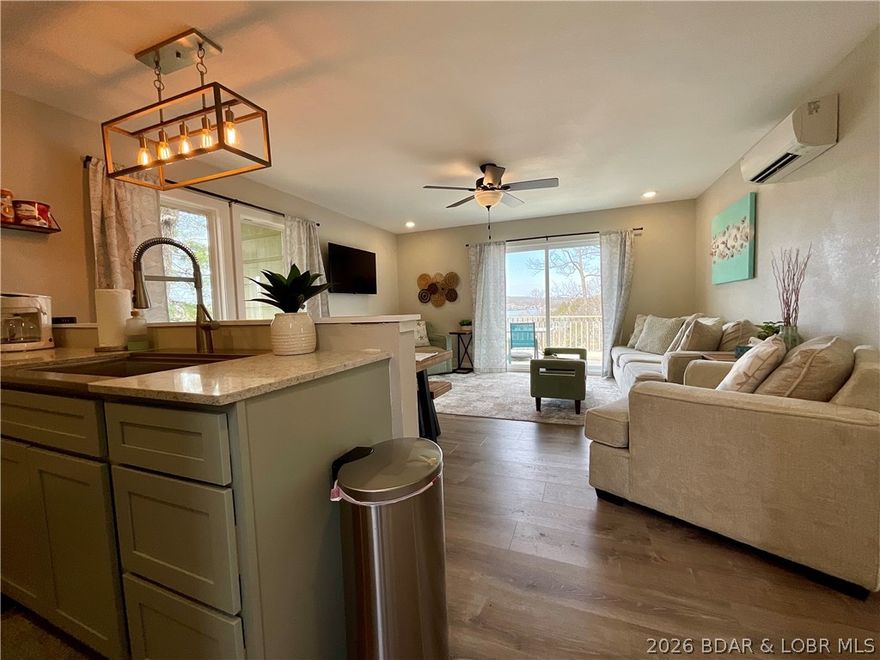 Welcome to lake living at its finest in the highly sought-after Tan-Tar-A Estates, neighboring Margaritaville Resort! This beautifully maintained home offers the perfect blend of comfort, space, and lifestyle—ideal as a full-time residence, vacation getaway, or investment opportunity. Step inside to discover an open and inviting floor plan with vaulted ceilings and abundant natural light.   The home is thoughtfully laid out for both relaxation and functionality. Enjoy stunning lake views from expansive decks, perfect for morning coffee or evening gatherings. Located in a golf cart-friendly community, you’ll love the easy access to an incredible list of amenities including pools, playgrounds, and FREE golf. Just minutes away, Margaritaville offers restaurants, bars, a swim-up pool, spa, arcade, bowling, and endless entertainment. Centrally located by both land and water, you’re close to everything Lake of the Ozarks has to offer—dining, shopping, and attractions. Whether you’re looking for a turnkey lake retreat or a high-demand rental property, this home checks all the boxes.