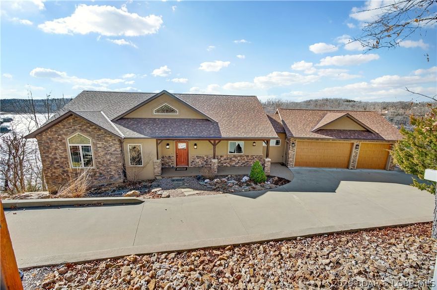 Every great lake story begins with a view and this Cross Creek estate delivers one of the most captivating settings on Linn Creek Cove. Offered by its original owner, this meticulously maintained 5-bed, 6-bath lakefront home blends timeless craftsmanship with exceptional lake living. The main level showcases soaring ceilings, rich wood accents & open, light-filled spaces designed for both everyday comfort and entertaining. The layout flows effortlessly to outdoor living, where deep, year-round water and included concrete dock create the perfect lakefront experience. The dock features two 12x30 slips, 12x22 swim platform & 4x8 storage locker, ideal for boating, swimming, and hosting lakeside gatherings.Below the three-car garage, a large unfinished area offers endless possibilities for expansion, whether a guest suite, theater room, fitness space, or game room. Located w/in the Cross Creek community, owners enjoy access to a pool & clubhouse, while the property also offers potential for short-term rental use or a 1031 exchange opportunity. Pre-listing inspected and including a one-year home warranty, this lakefront retreat delivers peace of mind along with an exceptional lifestyle.