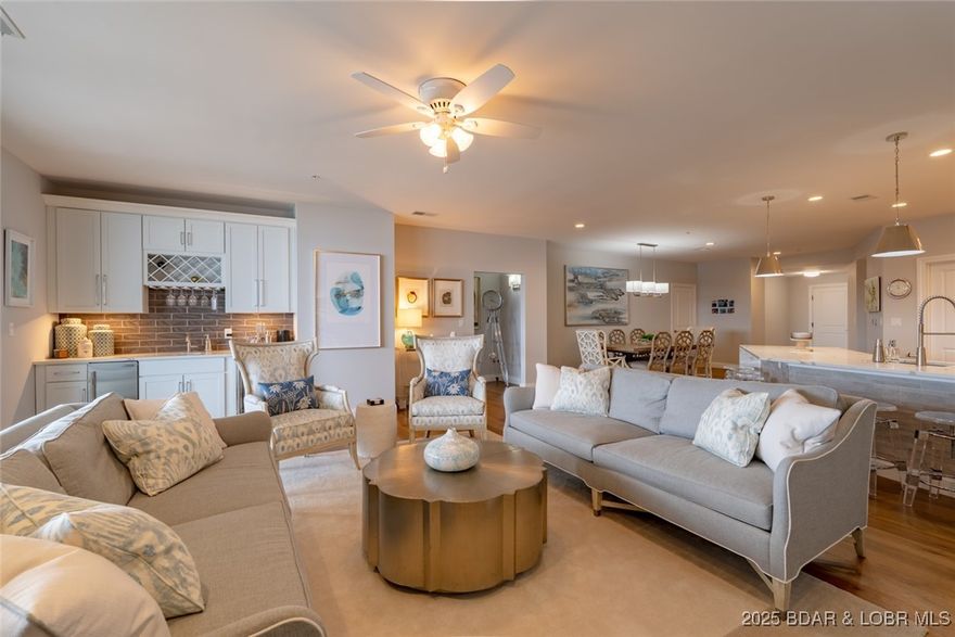 Ultra-luxury lakefront living at Cypress, where refined design meets resort-style amenities. This stunning 4 bed, 4.5 bath condo offers an exceptional layout with every bedroom ensuite and lake views from both sides. Two east-facing lakeside bedrooms function as primary suites, while the two west-facing bedrooms capture peaceful sunset views. The open-concept living space is beautifully finished with high-end materials, elegant built-in shelving, a wet bar, large pantry, and full-size laundry room. Professionally decorated throughout, every detail feels thoughtful and elevated. Sellers even added more updates after unit was completed to put it "over the top". The enormous lakeside lanai is ideal for entertaining or simply enjoying the waterfront views. Included is a 14x40 boat slip with 20,000 lb hoist and custom touchless boat cover. Cypress amenities include onsite management and maintenance, infinity pool, fire pit, Green Egg and gas grills, custom cabanas, fenced dog park, private wine locker (3E), 24-hour gym, keyless entry, smart thermostats, and two elevators providing zero-step entry. This is lake living without compromise.