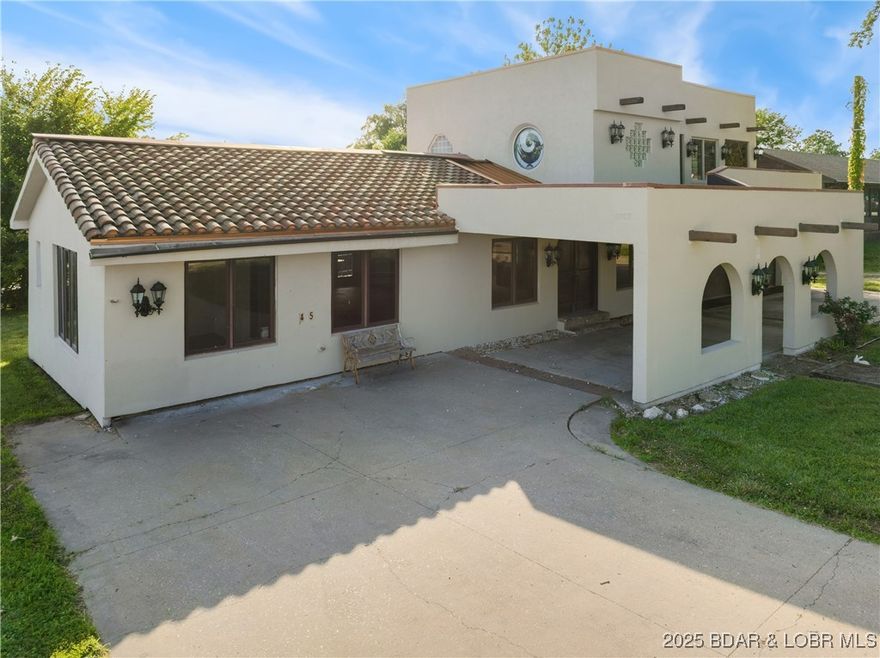 BIG PRICE REDUCTION This one-of-a-kind home is full of character and updates. Featuring 3 bedrooms, 2 full baths, and approximately 2,500 sq ft of living space, it offers a spacious layout with unique design details. The kitchen includes a center island with a cook top and brand-new counter ops. Completely renovated bathroom with new walk-in tile shower, updated sink, and modern fixtures. The upper-level primary suite is truly over sized and features a see-through wood-burning fireplace, a large walk-in closet, and private deck access. You'll love the abundance of natural wood and exposed beams throughout the home, giving it a warm and rustic charm.
Outside, enjoy a circle driveway, covered carport, and a huge attached garage with room for up to 4 vehicles. The garage is drywalled, heated, cooled, and includes laundry facilities, a water softener, and water heater.
Located in-town, just minutes from the Camdenton square, this property offers easy access to everything while still feeling private and unique. Vacant and easy to show — this is a standout property that you won’t want to miss! Could be be changed to Commerical Business if you want to have a Business in this place !!!!!