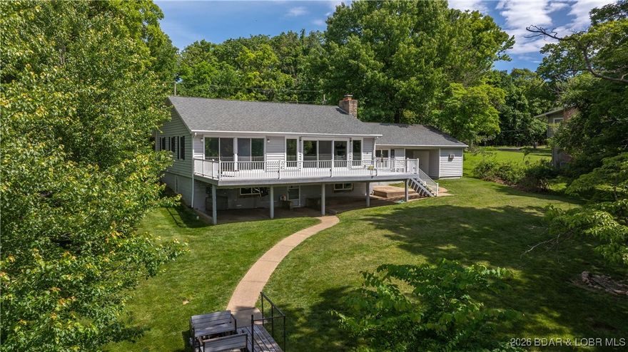 Lakefront living at its finest! This updated 4-bedroom, 3-bath home sits on a rare 1-acre lakefront lot at the 17MM of the Osage Arm, offering privacy, space, and elevated water views. The two-well dock features a swim platform, waterslide, and two PWC lifts—perfect for enjoying endless days on the lake. Multiple expansive deck and patio areas provide ideal spaces for entertaining or relaxing while taking in the scenery.

Inside, you’ll find updated finishes, an open and inviting layout, and generous living areas designed to comfortably accommodate family and guests. The lower level adds additional recreation and gathering space, making this home well-suited for hosting or maximizing rental potential. This property truly move-in ready.

A recent appraisal is available for added buyer confidence and peace of mind. Located just minutes from the Bagnell Dam Strip, you’ll enjoy quick access to restaurants, shopping, and nightlife while maintaining a private lakefront setting. Whether you’re seeking a full-time residence, vacation retreat, or income-producing investment, this property delivers the best of Lake of the Ozarks living. Schedule your showing today!