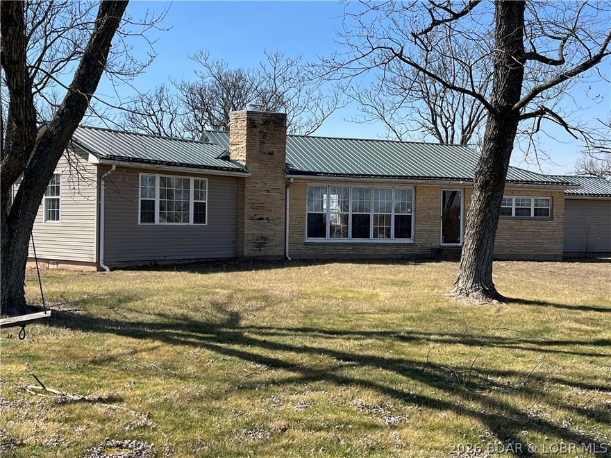 3-bed 1-bath fixer-upper nestled right in the heart of St. Elizabeth and is just waiting for your creative genius (or an episode of your favorite renovation show) to transform it into the envy of the neighborhood! A spacious 1,500 sqft of potential, where every room is a blank canvas just waiting for your Pinterest ideas! Yes, you read that right! Over 2 acres of land to turn into whatever your heart desires. Gardens? Chickens? A mini golf course? The sky's the limit unless you run into zoning restrictions, of course! Experience the unique aesthetics of a home that might have a few… shall we say, “character” quirks? If your idea of a great weekend involves a paintbrush, some questionable home improvement decisions, and a minor trip to the ER, this home is for you! Channel your inner handyman (or woman) and create your dream space while racking up some truly entertaining stories. Enjoy the convenience of town living while still having room for all those projects you’ve been wanting to tackle (or avoid until the last minute). So whether you’re a seasoned DIY expert or someone who just likes watching those makeover shows, this home is the perfect canvas for your next great adventure.