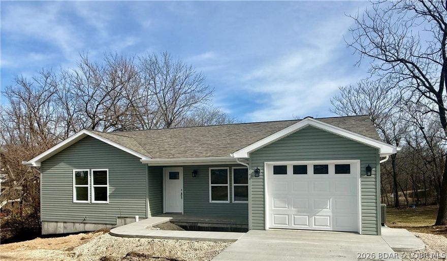 A BRAND NEW HOME  ( under $300,000.) from one of the best local contractors known for quality and attention to details,  
This one is must see; 3 bedrooms and 2 baths, open living plan, all NEW appliances in the kitchen, finished 1 car garage with remote.  This home is move in ready.  New HVAC with duct work, hot water heater is new, located in a "tall" crawlspace, water softener and water filter system already to go.  Deck off the dining area with a view of the wooded back yard, you might forget you are in town.