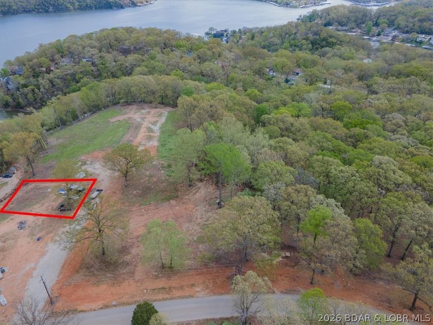 Beautiful lake view lot ready for your next build. This level parcel makes construction easy, with utilities already in place to save time and expense. Enjoy a convenient location close to local amenities while still taking in the peaceful surroundings and scenic views. An excellent opportunity to build your dream home or invest in a prime location.