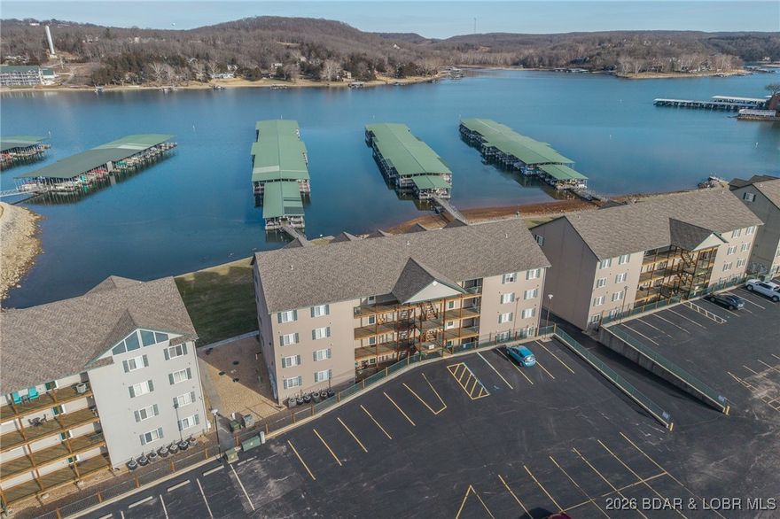 Top floor 3-bedroom loft unit spanning over 1400sqft! Welcome to Cedar Glen condos! One of the most desired complexes on the entire Lake of the Ozarks! From its level lake frontage, two heated pools, trailer parking, boat ramp, playground and volleyball court there is something for everyone! Unit comes fully furnished and has had many recent updates including all new interior wall paint, new luxury vinyl floors, new glass shower doors, new refrigerator, new microwave, washer and dishwasher! Massive, vaulted ceilings make this feel more like a home than a condo! FULLY FURNISHED & ready to go! Main floor offers two bedrooms, one is lakeside Primary suite with access to lakeside deck, nicely updated kitchen with newer granite countertops, large open living/dining area w/ gas fireplace and a full guest bath. Upstairs the loft area doubles as a 2nd living area and a 3rd bedroom! 10x24 slip included and is on dock 3 right in front of condo! Cedar Glen is conveniently located just 5 minutes to Camdenton and right next to Lake Valley Golf club and Old Kinderhook! 13mm of the Big Niangua means much calmer water! Hurry-This one won't last long!