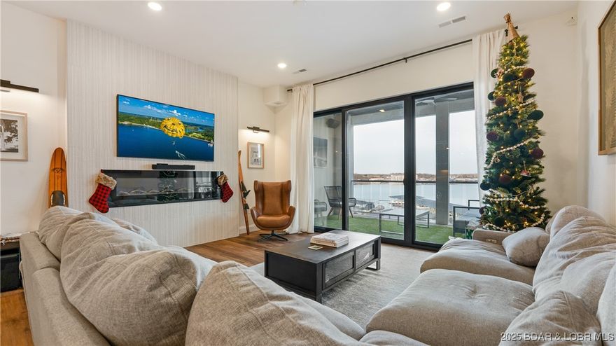 CALLING ALL HOSTS, ENTERTAINERS, AND LAKE-LIFE LOVERS! This top-floor 3 bed, 3 bath condo in the heart of Osage Beach is designed to be the gathering place. Located in a prime setting directly across from the new Oasis Amusement Park, this unit offers an ideal blend of location and lifestyle. Built for entertaining, the open layout is enhanced by customized luxury lighting, extended fireplaces, and a whole-home Sonos sound system that creates the perfect atmosphere for hosting. Upgraded matching quartz countertops, upgraded tile flooring throughout all bathrooms, and additional wiring throughout the condo allow for automatic blinds, expanded lighting, or additional speakers. Being sold fully turnkey with top-of-the-line furniture, appliances, premium TVs, and curated lake-life décor, this condo is truly move-in or rental ready. Whether you’re seeking a personal lake retreat or a high-end rental investment, this top-floor unit delivers comfort, convenience, and strong income potential in one complete package. Rarely available and built for entertaining—schedule your showing before it’s gone.