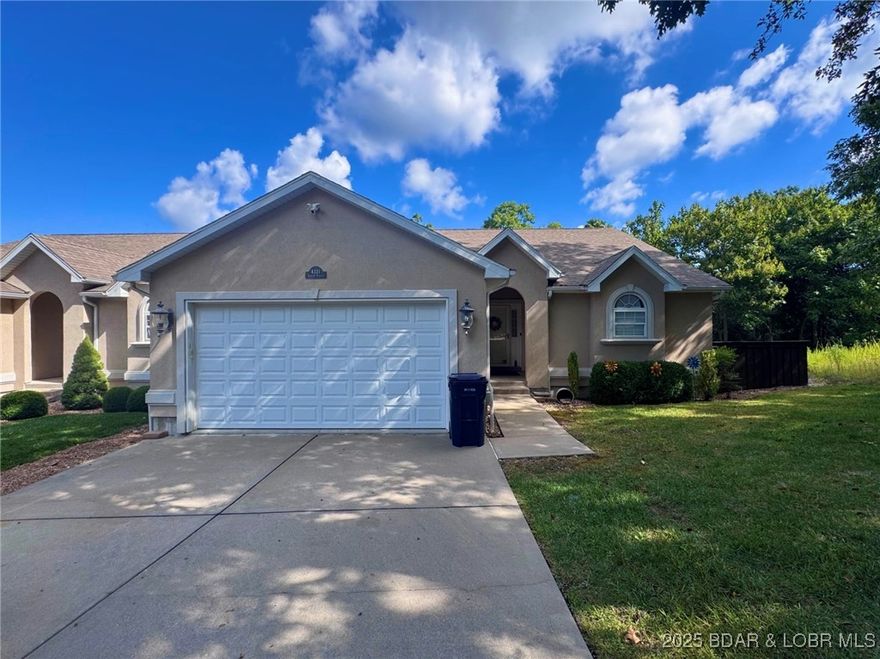 PRIME LOCATION in heart of Osage Beach! IMPECCABLE CONDITION LAKE LIFE PERFECTION.Nestled in one of the most sought-after areas,beautifully maintained home is just minutes from shopping,dining, & entertainment.From the moment you arrive,the pristine exterior & inviting covered entry set the tone for what’s inside.Step into an open layout filled w/abundant natural light,vaulted ceilings,& recessed lighting throughout.The kitchen is a true gem-stainless appliances,extensive cabinetry,expansive countertops,a stylish stone backsplash,& a breakfast bar ideal for entertaining.The living room is warm & welcoming, anchored by a striking stone-surround electric fireplace-adds both style & cozy ambiance.Generously sized primary suite-a private retreat,w/a spa-inspired bath showcasing a dec. tile walk-in shower,dual vanity,tile flooring,& an oversized mirror.Outdoor living on 2 composite decks-1 covered-accented w/sleek metal railings & perfect for relaxing or hosting.The lower level shines w/modern LVP flooring, while the fenced, low-maintenance backyard means more time to enjoy the lake. Included is the flexibility of a 4 bedroom (non-conforming). Added bonus long term rentals are allowed!