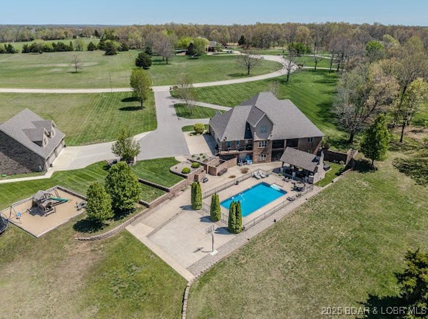 STUNNING BRICK & STONE 1.5 STORY HOME W/FULL FINISHED WALK OUT BASEMENT ON 7.84 ACRES !! THIS MODERN FRENCH COUNTRY STYLE HOME OFFERS 5 BEDROOMS, 4.5 BATHS, HEATED IN GROUND POOL, OUTDOOR FIREPLACE, MAIN LEVEL LIVING ROOM, MASTER SUITE W/NEW UPDATED MASTER BATH, HEATED SOAKING TUB, LARGE WALK IN TILE SHOWER, DBL VANITY, OVER SIZED CLOSET. THIS HOME WAS JUST UPDATED W/NEW GRANITE KITCHEN -BATHS-BAR, THE KITCHEN HAS A LARGE CENTER ISLAND, WALK IN PANTRY, 2 STORY ENTRY WAY & LIVING ROOM W/GAS LOG FIREPLACE, FORMAL DINING, LARGE LAUNDRY. 1/2 BATH OFF THE GARAGE.LOWER LEVEL FAMILY ROOM, 2 BEDROOMS ON THIS LEVEL WET BAR, SCREENED IN PORCH, GAME ROOM, EXERCISE ROOM, FULL BATH, ACCESS OF THE AMAZING OUTDOOR SPACE. THE SECOND LEVEL OF THE HOME OFFERS 2 BEDROOMS, EACH HAVE FULL BATHS and WALK IN CLOSETS, A STORGE ROOM, THIS HOME OFFERS 6458 SQ FT OF LIVING SPACE, A 3 CAR ATTACHED GARAGE, PLUS A NEW IN 23 OVER SIZED 40 X 46 GARAGE, GUN -SAFE ROOM, THE 2ND LEVEL IS A GREAT GUEST SPACE, EVENT OR GAME AREA, LARGE BAR, FULL BATH W/CUSTOM TILE SHOWER, LVP FLOORING, LIVING AREA, SLEEPING AREA. THIS HOME IS CLOSE TO PARKS, SCHOOLS, EASY ACCESS TO I-44 MAKE YOUR APPOINTMENT TODAY !