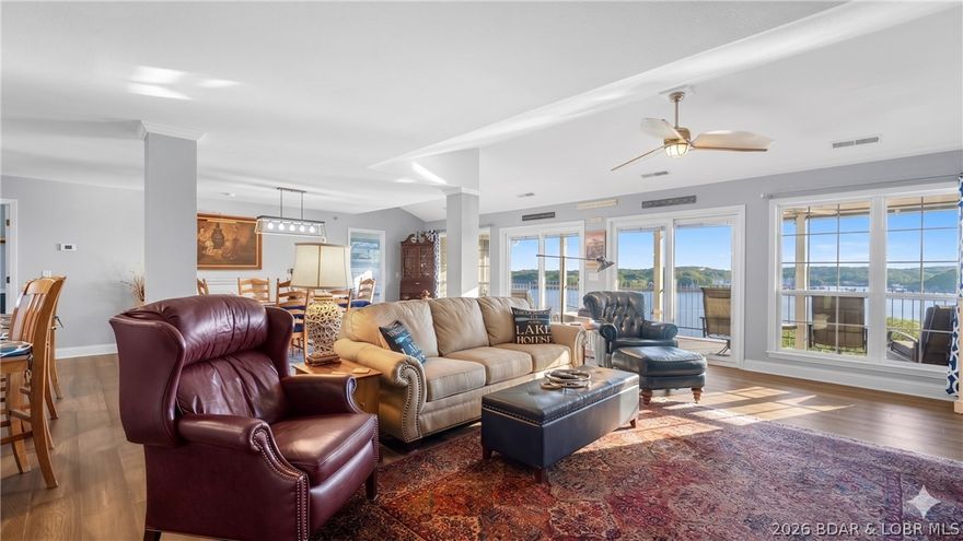 R-A-R-E Top Floor Hilltop Penthouse at Harbour Towne! Behold EXCEPTIONAL ONE LEVEL LUXURY LIVING with 2100 sq. featuring 4 bedrooms, 4 full baths & million dollar lake views that will capture your heart! Pamper guests with TWO lakeside primary suites plus a junior suite all with private baths.  Relax watching the boats go by with the expansive 30' covered & screened deck. Entertainer's dream with grand living & dining spaces, gourmet kitchen, granite, 14' island & SS appliances. Second deck is ready to show off your BBQ skills. Updates Galore - see feature list. Experience the quiet enjoyment that only second tier can bring with no compromises to view or amenities. Resort style heated pool, tennis & pickelball, easy entrance & reserved parking all at your fingertips. 12 x 28 Slip included, Garage is available for 35k extra. Enjoy Heated Pools, Clubhouse, Fitness, Walking Trail, Wave Breaks, Lakeside Boardwalk. Perfect location at the 1MM & only a few min off Hwy. 54 & close to Bagnell Dam Strip with shopping, restaurant's & all the action. 2 Night minimum for rentals. ROCK SOLID HOA with strong reserves! There is clearly NOTHING LIKE THIS GEM on the market today!