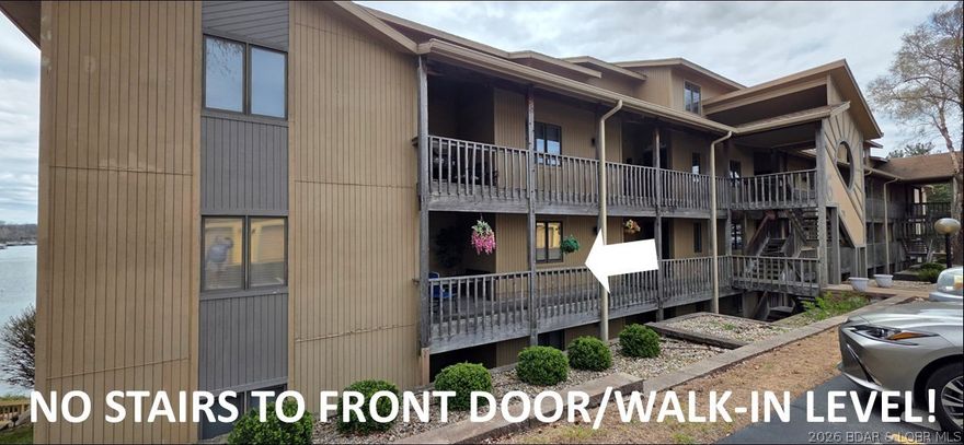 Boating Season is Quickly Approaching! Deals like this don't come along very often... PARKING LOT LEVEL Condo (no stairs to the front door) WITH a GARAGE and a 40 foot long covered cruiser BOAT SLIP on MILE MARKER 10 with a BEAUTIFUL VIEW OF THE LAKE - grab this deal quickly! It comes TURN-KEY, FURNISHED, MOVE-IN READY WITH A BOAT! All you need to bring is your tooth brush and swimming suit! Included in sales price: 2004 21' Tritoon Laundau, remote controlled boat lift with tandem storage for 2 waverunners alongside the boat. Boat dock is covered, has electricity, and water for cleaning the boat in a cove location with year-round deep water and protected by wavebreaks. Garages are a rare commodity in this complex - this condo comes with one that is insulated, with 220 electric, electric opener, built-in shelves and workbench. Ranch unit with open spacious floorplan! Kitchen has been updated with TWO REFRIGERATORS, deep pantry with spin-out storage shelves for easy accessibility, newer granite counters, oversized composite black granite sink, and breakfast bar seating open to the dining room. Both baths have been updated! New jetted tub with new tile surround! Updated flooring!