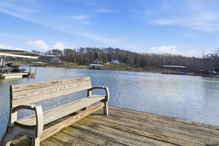 Under Contract/ Showing for backup offers. Welcome to Dragonfly Cottage: Your Year-Round Lakefront Escape! Ring in the NEW YEAR from your very own sanctuary! Located at the 68 MM, Dragonfly Cottage is a fully furnished, turnkey two bedroom, 1.5 bath home offering the perfect blend of cozy winter comfort and summer adventure. Why you will love it: Year-Round Water access situated in a quiet cove where you will enjoy water levels perfect for fishing or using your private swim dock. This property has ample space to add a a larger dock to house your boat. Join a welcoming cove community known for its friendly neighbors and peaceful atmosphere. Whether you are looking for a permanent residence, a weekend getaway or short term rental investment this cottage is ready for You! Ready to see it in person? Schedule through Showtime. This home is being offered "AS IS"