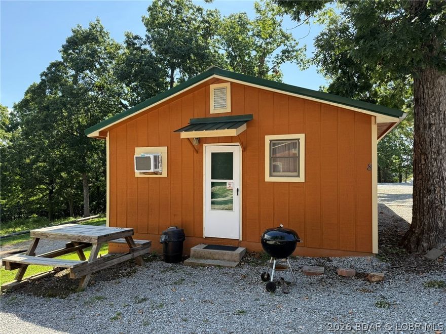 Cabins 8 and 9 are a duplex unit with a connecting door. Just down the road from Truman State Park Marina giving you quick and easy access to Truman Lake, while also being close to Drake Harbor where you can access the Lake of the Ozarks. The two units have been successful rentals and have a long clients list. Would make for a great income producing opportunity.