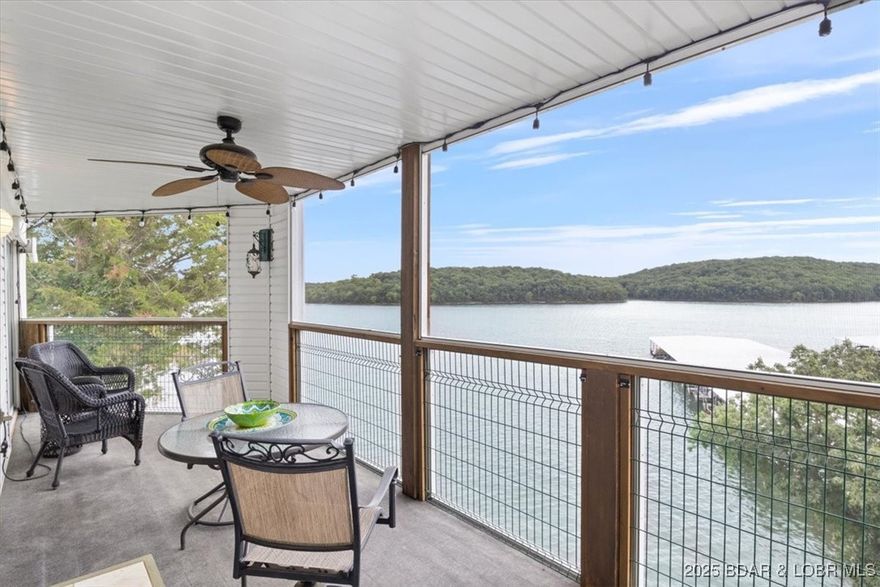 $5,000 Credit toward living room furniture– Design Your Living Room Your Way!  Step into the ultimate lakeside haven with this accessible, no-steps 3-bedroom, 2-bath condo, boasting breathtaking, mile-long views. Perched in the coveted State Park area, it's just minutes from vibrant shopping and dining, making every adventure—from a serene sunset cruise to a lakeside dinner or a full day on the water—easily within reach. This prime location ensures you're always at the heart of the action. Fully furnished and completely move-in ready, this condo is crafted for maximum convenience, allowing you to dive straight into the lake life without any hassle. The open floor plan and end-unit layout flood the space with natural light, creating a warm and welcoming atmosphere. Relax on your private balcony, soaking in the stunning vistas that stretch as far as the eye can see. Boating lovers will be thrilled with the included 12x30 boat slip featuring a 4,000 lb hoist and a PWC slip just steps away When you're ready to unwind on land, take advantage of the impressive community amenities, including a sparkling pool, clubhouse, exercise room, playground, and a cozy fire pit