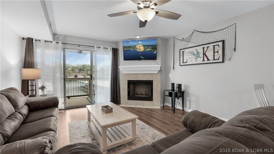 This exceptional condo is a proven income-producing rental delivering immediate returns—yet so inviting, you may be tempted to keep it all to yourself. Recent price improvement makes this an even stronger opportunity, and with bookings for the season already ramping up, this unit will only be available through April. The open-concept kitchen, dining, living area flows seamlessly to a newly rebuilt, oversized covered deck—complete with new patio furniture and ample space to relax or entertain. The spacious primary suite offers walk-in closet, updated en-suite with tiled walk-in shower, and private deck access. The kitchen features refreshed cabinetry, countertops, and stainless-steel appliances. Both bathrooms have been updated with newer vanities, counters, tile flooring, and tiled showers. Additional upgrades include LVP flooring, ceiling fans, and furnishings throughout. Offered fully turn-key, this condo includes all furniture, appliances, and a 10x30 boat slip. Ideally located within the building near the point pool, interior pool, sand beach, playground, and dock. Situated in the sought-after Ledges at the 21MM—just minutes from dining, shopping, and lakefront favorites.