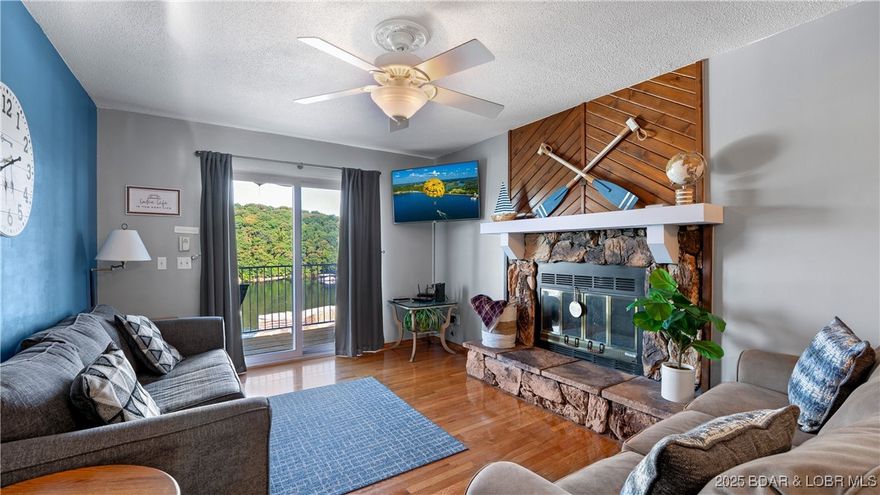 Affordable, rentable, and perfectly positioned on the lake—this walk-in condo checks all the boxes! With just two easy steps from the parking lot, convenience meets comfort from the moment you arrive. Enjoy beautiful 4MM views from your private deck, with access from both the living room and the primary bedroom. Inside, you’ll find a cozy fireplace and a functional layout designed for both personal use and investment. The lockout feature with a second entry door creates excellent income-producing potential, allowing for flexible rental options. This unit is being sold fully furnished, with only a few personal exclusions, making it truly turn-key. Community amenities include a pool, and you’re just steps from Dock Knockers and Wheel House Marina, where boat slips are available to rent—making it easy to start enjoying the Lake lifestyle right away. Nightly rentals allowed.