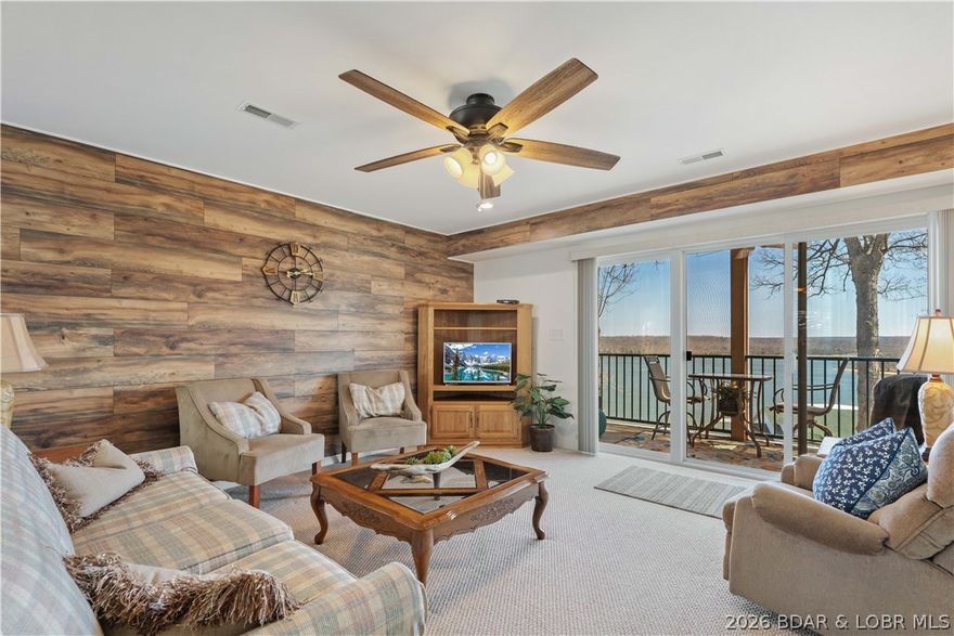Only 4 steps into this super clean 2 bedroom condo with one of the best views in the complex.  It is fully furnished and just waiting for you to come sit and enjoy the view with your favorite beverage in hand.  The bay window helps make this a light and bright unit.  Located within the state park, this is a great place to enjoy the lake.  The best fishing, skiing and boating is done right out your door.  There are only 8 units in this building set apart from the rest of the complex making it more private.  An elevator in bldg 10 will take you down to your 10x24 boat slip that is included.  Community pool, clubhouse, exercise room, playground and lots of green space is enjoyed right here.  Pet friendly complex where neighbors take morning strolls through the beautiful state park.  Located on the quieter arm of the Lake of the Ozarks is where you will find your new lake escape at Park Place on the Lake Condos.  Complex does allow rentals but this unit has never been rented.  Life is short, spoil yourself, you deserve a lake escape.  Dreams to Reality.  Call today!