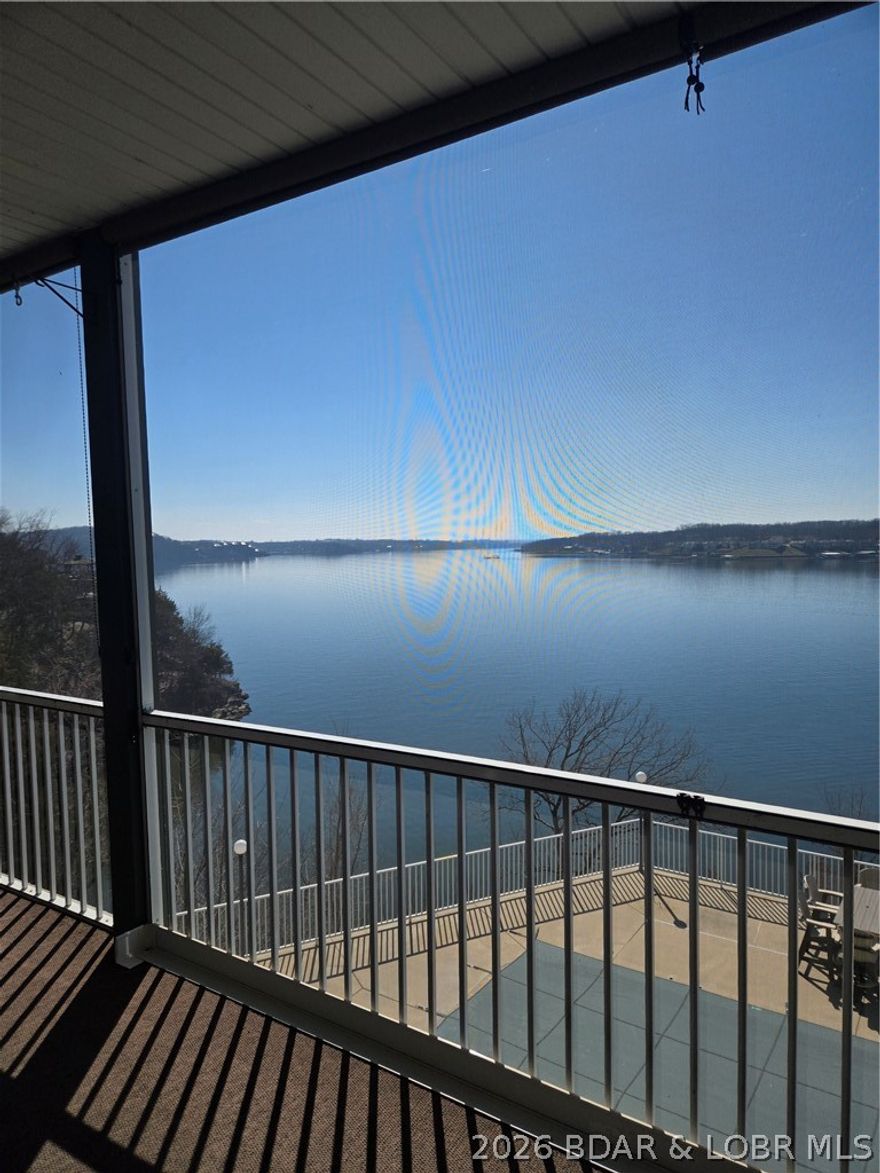 Walking in the front door you will immediately see the 10-mile view of the lake!!! Check out the video. This home boosts 3 bedrooms with king beds with large closets. 3 full size bathrooms. The patio is 450sqft screened in, great for entertaining, take your meals on the patio. Full size laundry room with a water softener, washer / dryer. Extra nice living room, dining room table and chairs seats 6 with views of the lake from any seat.  This location is close to so many restaurants, shops, grocery store, mini golf and go carts tracks, plus we are surrounded by the best golf courses in the mid-west! This is a single building with 12 units, lots of privacy.