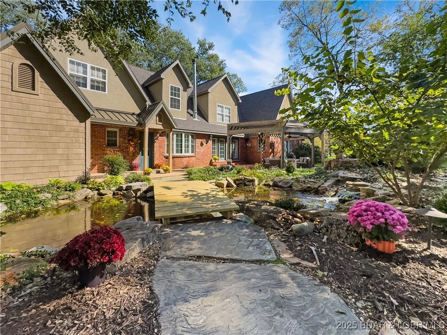 Just minutes from town, this nearly 70-acre estate blends rustic charm with refined living. The setting feels like an English countryside retreat, with rolling pastures, wooded acreage, and a collection of timeless outbuildings that tell the story of the land's history. The 4,643 sq ft home offers 4 bedrooms, 3 full and 2 half bath, and a comfortable flow designed for everyday living and entertaining. The chef's kitchen brings everyone together, while multiple gathering spaces and a primary suite with fireplace and his and her baths makes the home as functional as it is inviting. A carriage house above the 3-car garage adds flexible space for guests, a home office, or a studio. Outside stone patios, a pond, a waterfall, and small bridge leading to the entry create a setting that feel peaceful and private. For equestrian or hobby farm interests, the property also includes a two-story horse barn with loft, 2 professional horse stalls, and a fenced front pasture with freeze-proof waterers. A spring-fed creek runs through the property, adding to its natural beauty. If you desire a property with character, history, and room to breathe, this is it.