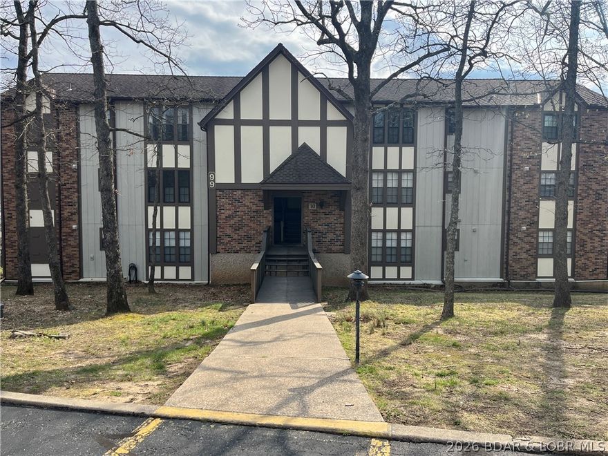 Wow!  Come see this beautiful condo at the 13 mm right next to The Lodge of the Four Seasons.  This unit features the expanded deck option allowing for spacious outdoor gatherings, grilling, and amazing lake views!  Waters Edge is a premier development, impeccably maintained, has onsite management, security, boat ramps, and slips are available to purchase.  With 1250 sf inside and the 38 x 10 covered deck, this is the perfect lake home!  HOA includes water, sewer, trash, pool, internet and basic cable.