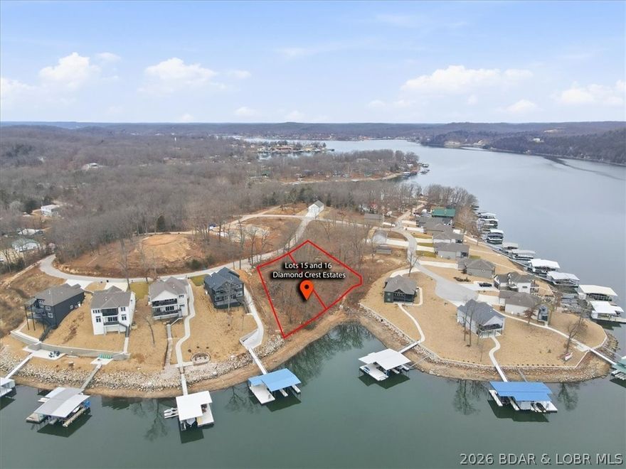 Design and build your dream lake home on these exceptional double waterfront lots in sought-after Diamond Crest Estates at The Lake of the Ozarks. Generously sized and beautifully positioned, this property offers plenty of space for a custom main residence along with a carriage house or multiple garages across 177' lakefront. Dock allowed - see potential dock sketch.  Enjoy stunning main channel views at the 45MM, providing both scenic beauty and some cove protection. Surrounded by upscale new construction, the subdivision features paved roads, central sewer, and a community water well, making it an ideal setting for luxury lake living.   McFarland Signature Builders, LLC is ready to construct your dream home here.