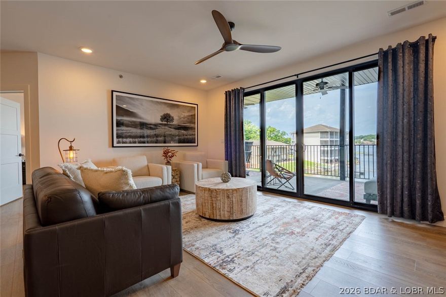 Welcome to the newest building at Robin’s at the Water’s Edge—one of the most premier destinations at Lake of the Ozarks! These brand-new 3 bed, 3 bath (all en-suites) units are designed for comfort and style, with open-concept layouts, upgraded flooring, granite or quartz tops throughout, and 8’ sliders leading to spacious covered concrete decks with stunning lake views. The lakeside master suite features a tiled shower and double vanity. Located at the 1MM on the Grand Glaize Arm, you'll enjoy gentle lakefront access and breathtaking main channel views. This ideal Osage Beach location puts you close to dining, shopping, and the State Park—perfect for boating, skiing, tubing, and fishing. Robin’s offers exceptional amenities including two private pools, a sandy beach, a covered/enclosed fishing dock, private boat ramp, and community docks with slips available. Elevator access to all floors ensures ease and convenience. Whether a weekend retreat or full-time residence, this is luxury lake living at its best. Photos from model unit 2A. A onetime fee of $1000 will be collected at closing from the buyer to establish reserves.