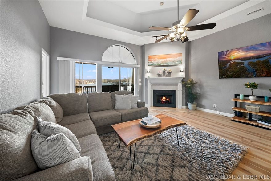 Experience the ultimate lakefront getaway with this fully furnished 3-bedroom, 2-bath condo at Lake of the Ozarks. Nestled right on the water, this beautifully updated unit offers breathtaking lake views, a spacious open-concept layout, and modern finishes throughout. Enjoy a cozy fireplace, expansive windows, and a gourmet kitchen featuring granite countertops, stainless steel appliances, and bar seating. The private primary suite includes serene lake views and an en-suite bath. Step out onto the large covered deck—perfect for relaxing or entertaining while taking in the picturesque surroundings. Boating is a breeze with a rare 14x56 boat slip and two jet ski slips included. Located just minutes from popular lakefront hotspots like Shady Gators and H. Toad’s, this turn-key property is ready for immediate enjoyment. Whether you're looking for a weekend retreat or a summer escape, this condo offers the perfect blend of comfort, style, and convenience at one of the Midwest’s most sought-after lake destinations.