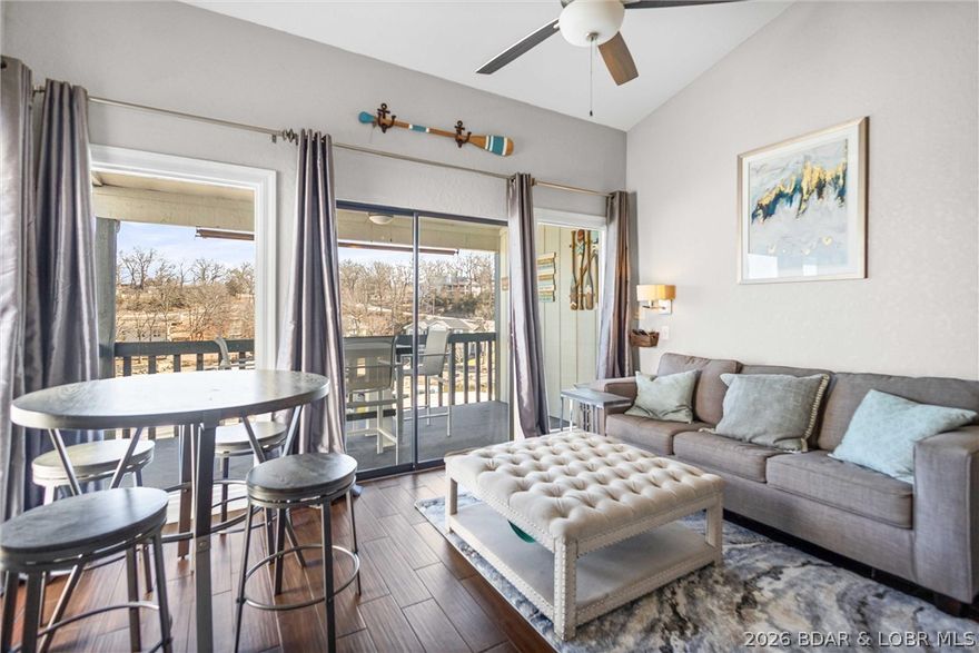 HAVE YOU BEEN LOOKING FOR A 12x 40 BOAT SLIP AND CONDO UNDER $200,000 !! Fully updated and move-in ready! This beautiful corner unit features stainless steel appliances & custom cabinetry. Vaulted ceilings create an open, airy feel while the corner location offers expanded views of the lake and abundant natural light. An upstairs loft provides additional sleeping space-perfect for guest or maximizing rental potential. Enjoy being just minutes from popular restaurants and lake attractions. This property also includes a generous 12 x 40 boat slip, giving you plenty of room for your boat and making lake days effortless. Lake living, updated style and unbeatable convenience . Rental income available upon request.