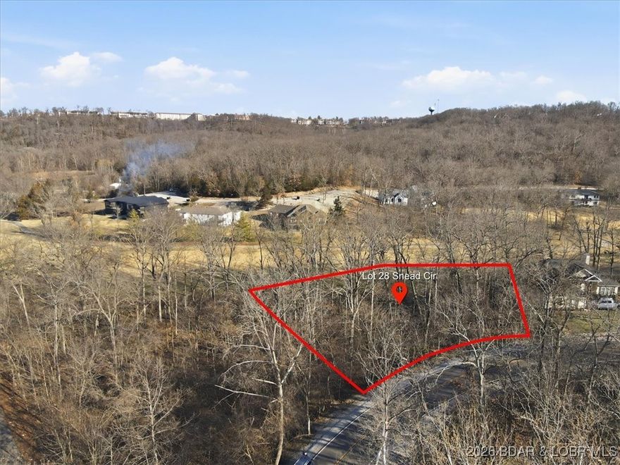 Nestled in the heart of the Village of Four Seasons, this exceptional build lot is located on the golf course within one of the area's most sought-after neighborhoods. The gently sloping terrain is ideal for a custom home with a walk-out basement, offering the opportunity to capture scenic golf course views and outdoor living space. Enjoy the convenience of nearby village amenities while being surrounded by natural beauty. The HOA provides an unmatched lifestyle with access to multiple outdoor pools, an indoor pool, tennis courts, playgrounds, a fitness center, hiking and biking trails, and boat launches. A rare opportunity to build your dream home in a premier location.