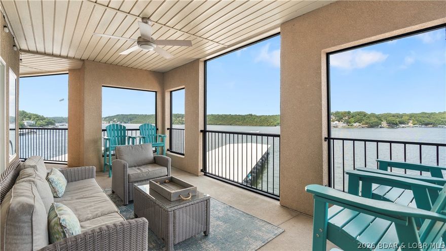 Experience elevated lakefront living in this beautifully maintained 3BR | 3BA Wedge Unit at the highly sought-after Tuscany Condominiums on Lake of the Ozarks. Perfectly positioned at the 31MM, this rare walk-in, no-step point unit features one of Tuscany’s most desirable floor plans with expansive living spaces and panoramic main channel views. Recent updates include stylish flooring, upgraded countertops, designer lighting, and premium appliances, creating a sophisticated yet comfortable retreat. The impressive 750 sq. ft. wraparound screened deck offers the perfect setting for entertaining or relaxing while taking in breathtaking four-corners views year-round. A 40’ boat slip with hoist is included, making lake days effortless. Additional amenities include elevator access to the lakeside pool and clubhouse, beautifully maintained grounds, easy dock access with no steps, and an optional dual PWC slip with lifts available for additional cost. Luxury, convenience, and lake life come together in one exceptional property. Call for a private showing today!