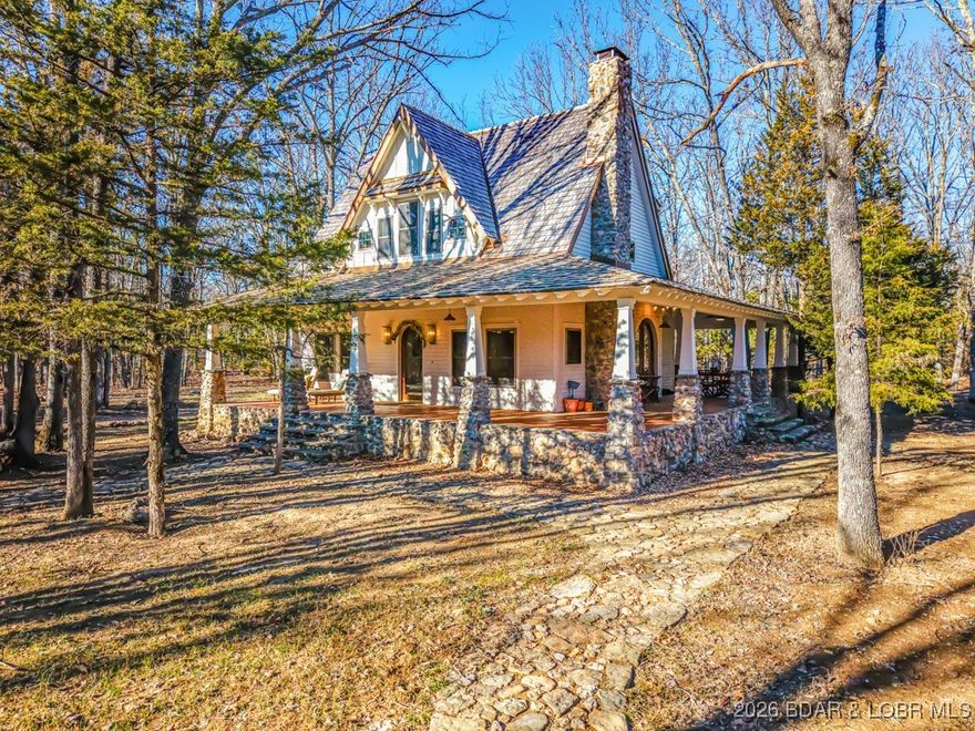 Step into a storybook setting where brand-new construction meets timeless cottage charm—this home feels straight out of a fairytale. Thoughtfully designed with timeless finishes throughout, this property captures cozy, whimsical living through custom cabinetry, vaulted ceilings, arched doorways, real hardwood floors, and a bright, open layout that feels elegant and inviting. The spa-like bathroom offers a walk-in tile shower and soaking tub, creating the perfect retreat. Three levels of living include a charming upstairs loft and an unfinished walk-out basement ready for your personal vision. Outside, a beautiful detached two-car garage with loft and its own porch adds both function and character. Enjoy peace of mind with Sherwin-Williams Emerald Rain Refresh paint with a lifetime warranty, LP SmartSide siding with a 50-year warranty, and a #1 cedar shake roof with a 40-year warranty. A stunning cedar wraparound porch frames serene sunrises and sunsets, while over 100 acres of quiet, flat, private land provide excellent deer hunting and a private stocked pond. Ideal as a full-time home, vacation getaway, or exceptional rental opportunity—this is a property you won’t want to miss.