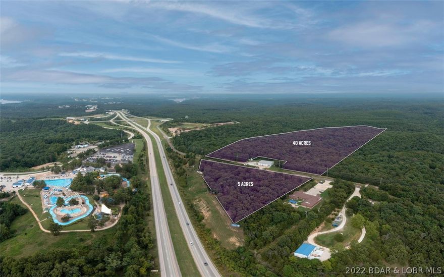 Approximately 5 acres with exceptional visibility coming from Camdenton to Osage Beach. Easy access using one of the few interchanges conveniently located between Bagnell Dam and Camdenton. Property is zoned B2 and has wonderful US Hwy 54 visibility with approximately 750 feet abutting the right of way. This 5 acres is part of a much larger tract and could be sold in larger packages. Easy access, great visibility and close to everything. What an opportunity for your commercial endeavor.