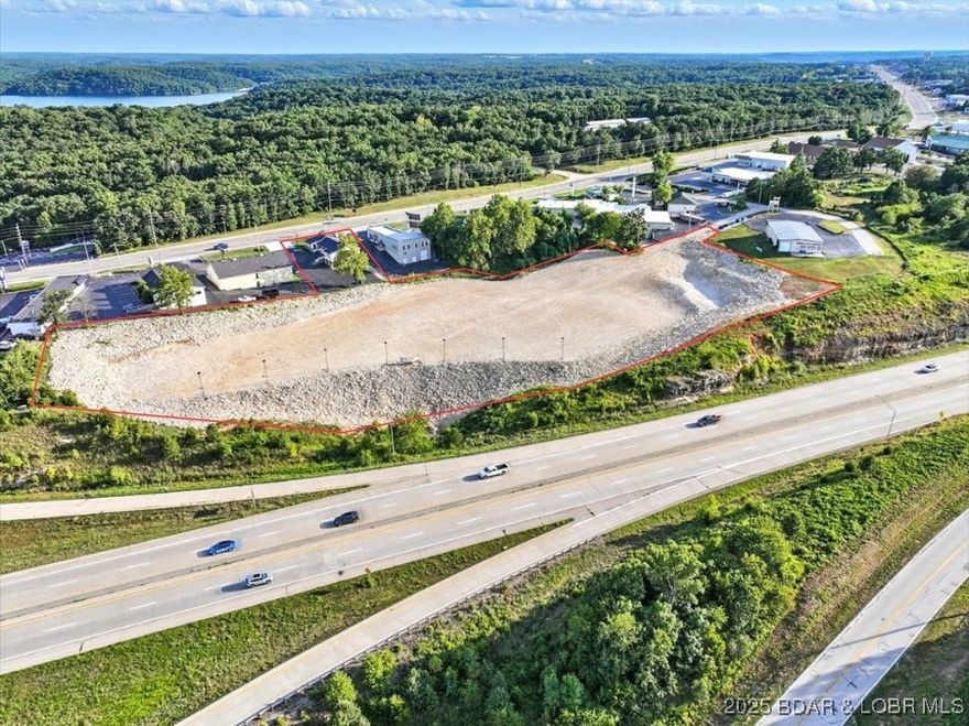 Discover the potential of this exceptional commercial property featuring approximately 4.78 acres and a stunning 4,477 sq ft building, ideal for a retail space, gourmet shop, spa, or professional office. The site includes newly excavated land, ready for visionary development such as an indoor sports complex, hotel, or retail storefronts. Boasting approximately 738 feet of Highway 54 frontage and visibility, this location offers unmatched exposure in a rapidly growing area. Just one exit away from the highly anticipated Oasis Amusement Park and the new 400-room Marriott hotel, and near the upcoming Bass Pro Shop, this property is perfectly positioned to benefit from increased traffic and tourism. Be part of an expanding and vibrant community. Whether you're an investor, developer, or entrepreneur, this is your chance to secure a high-profile location with limitless potential. Don’t miss your opportunity—schedule a viewing today!